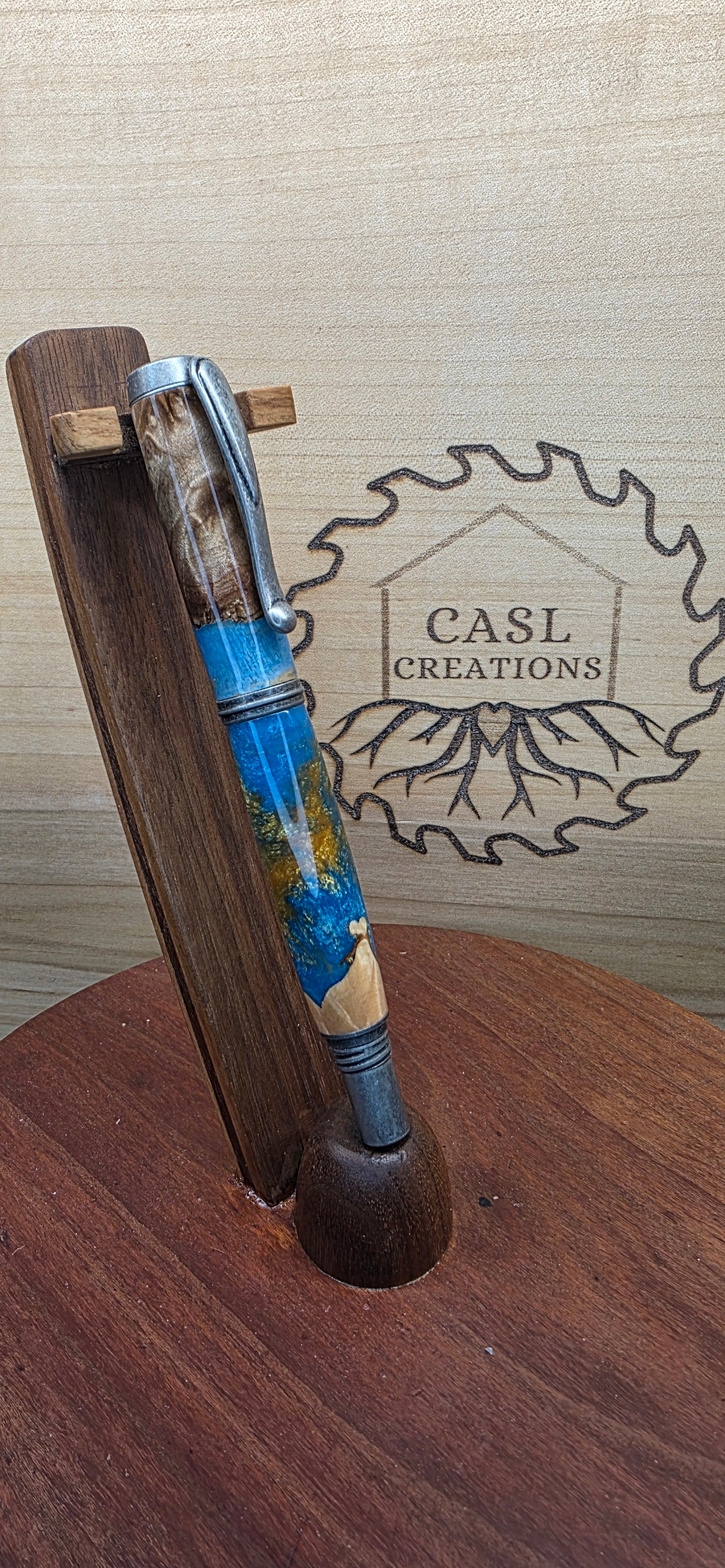Antique pewter Jr. George in brown mallee burl & blue and gold alumilite resin