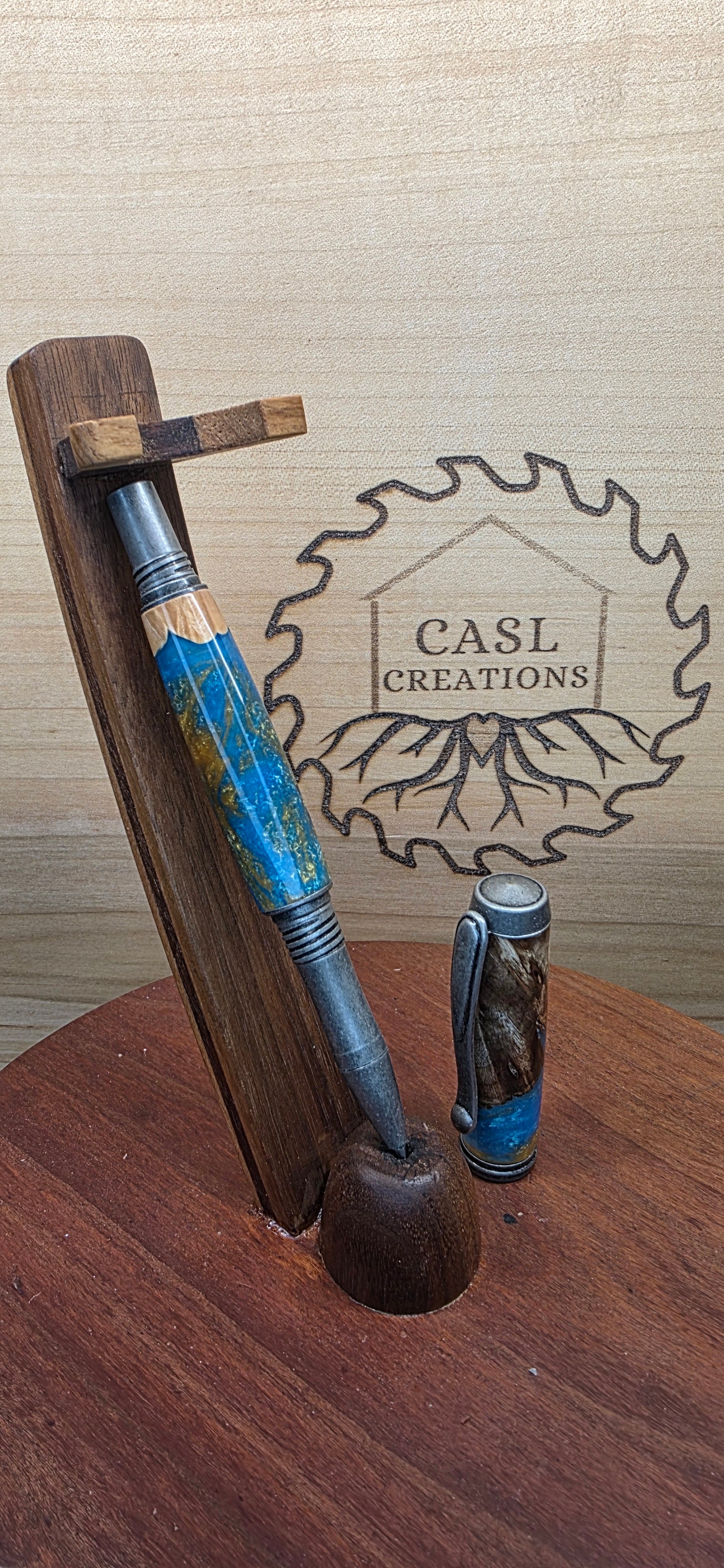 Antique pewter Jr. George in brown mallee burl & blue and gold alumilite resin