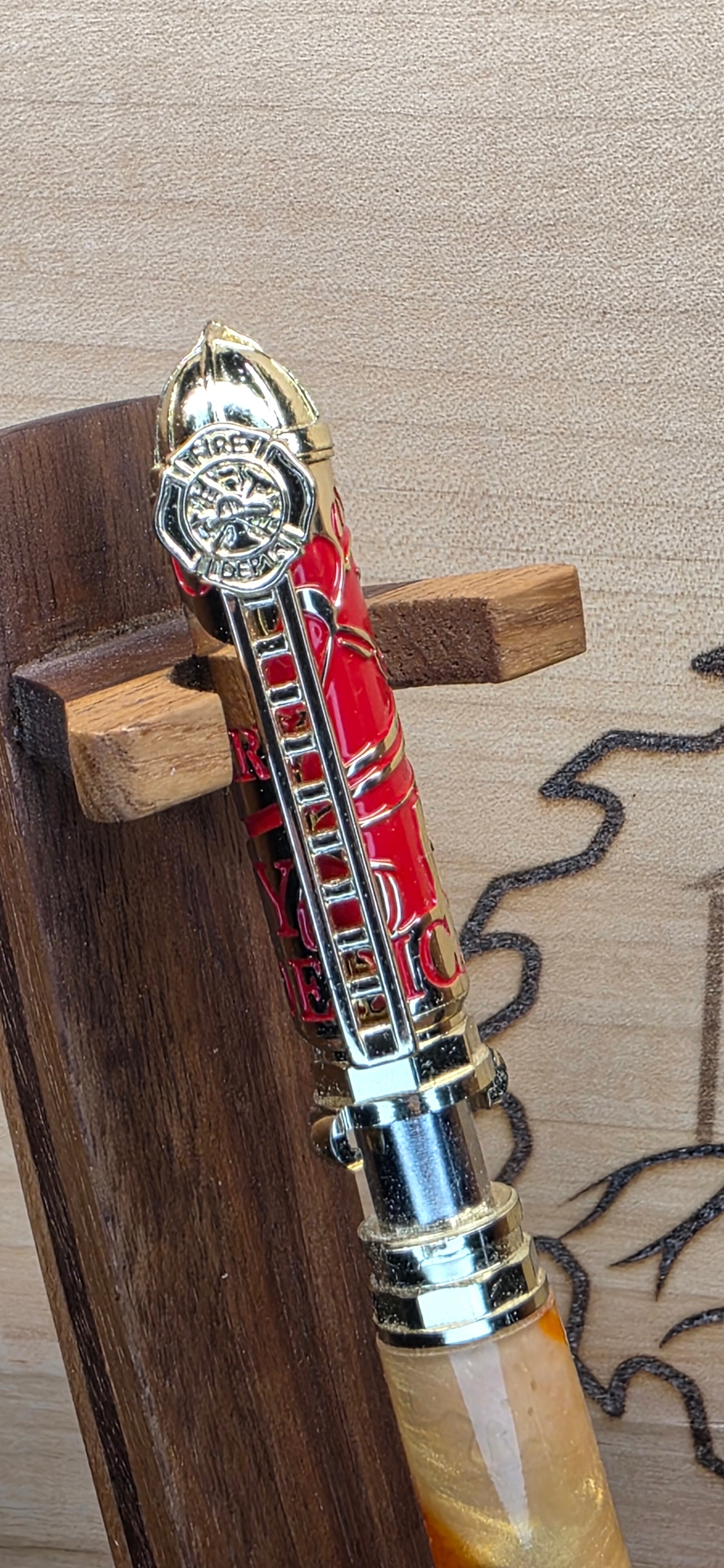 Polished Brass and Red Firefighter "Push and Lock" in red dyed maple and orange and yellow shimmering alumilite resin