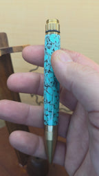 Antique Brass Fidget rollerball in crushed Turquoise truestone